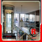 آسانسور شیشه ای 15 آسانسور شیشه ای 15 آسانسور شیشه ای (پانوراما) - قیمت آسانسور شیشه ای - طراحی و اجرای آسانسور شیشه ای سازه های شیشه آسانسور پانوراما (آسانسور شیشه ای) آسانسور شیشه ای